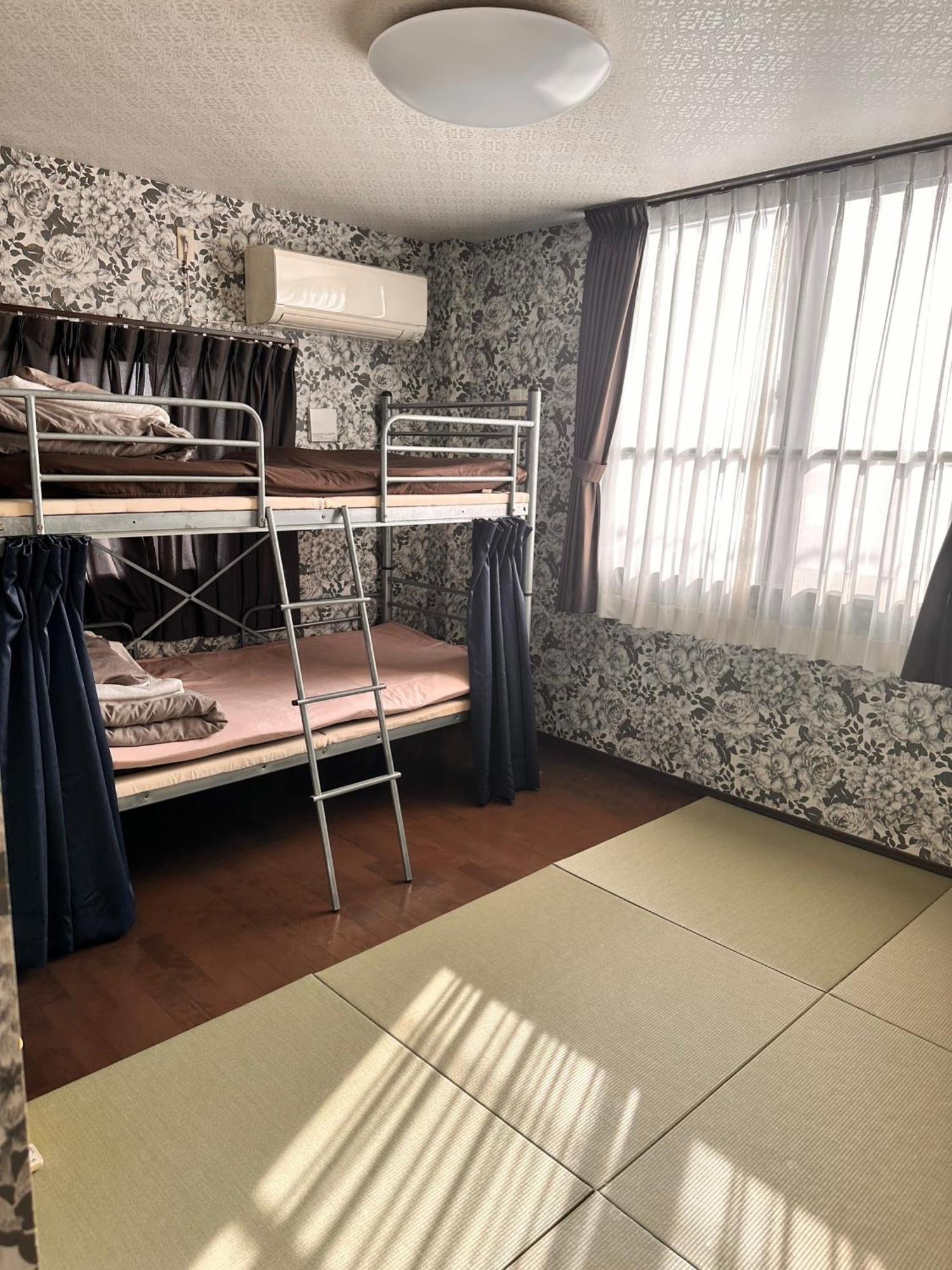 Guesthouse Tiga Kumamoto Zewnętrze zdjęcie