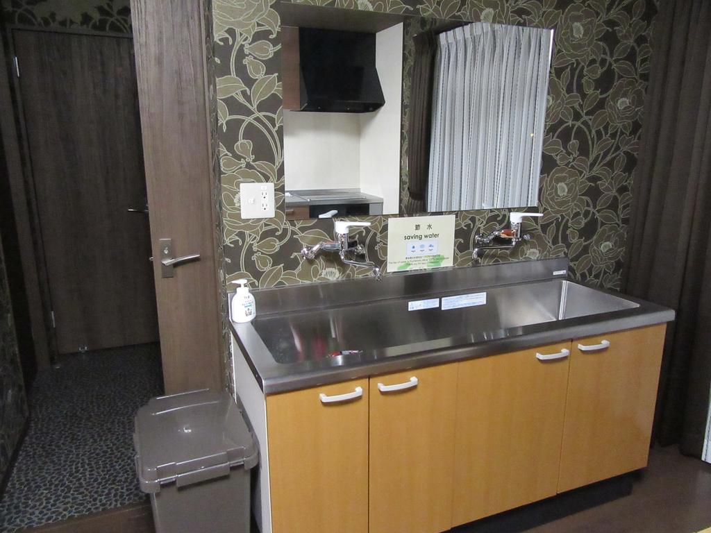 Guesthouse Tiga Kumamoto Zewnętrze zdjęcie